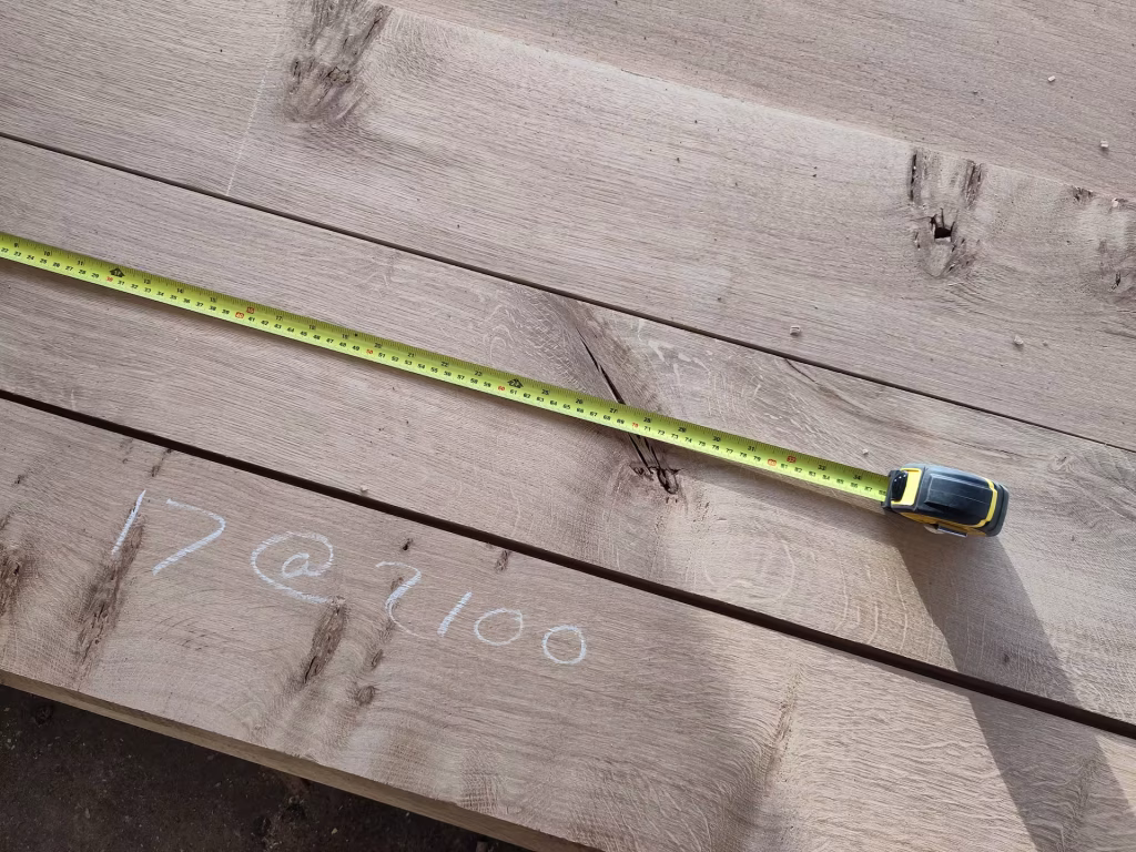 Scottish Oak boards being measured as part of a cutting list at Scottish Wood