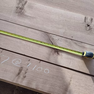 Scottish Oak boards being measured as part of a cutting list at Scottish Wood